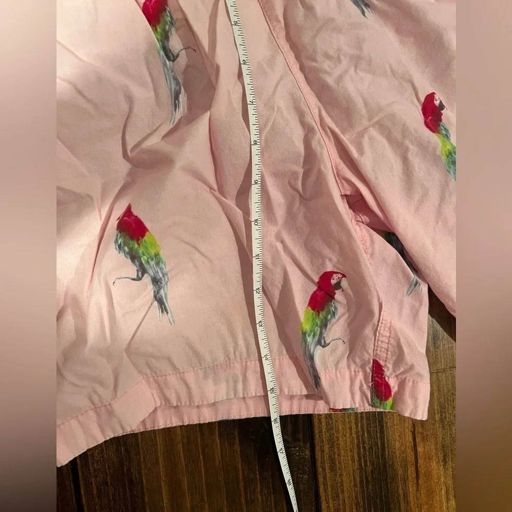 Modern Amusement men’s pink parrot print swim trunks size medium, GUC, lined.